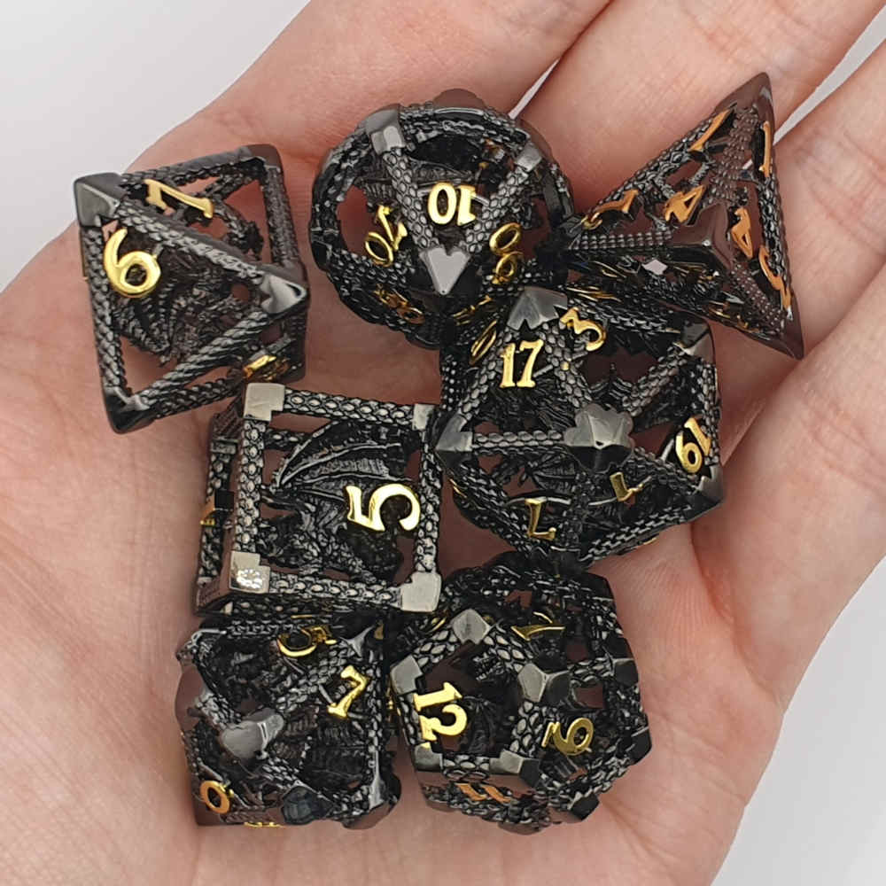Encapsulated black gold dragon metal dice set