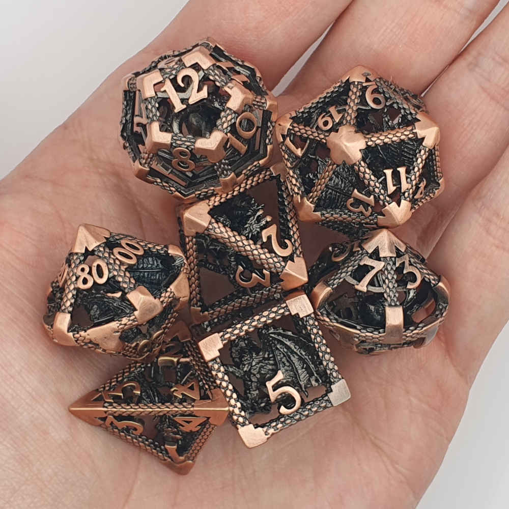 Encapsulated copper dragon metal dice set